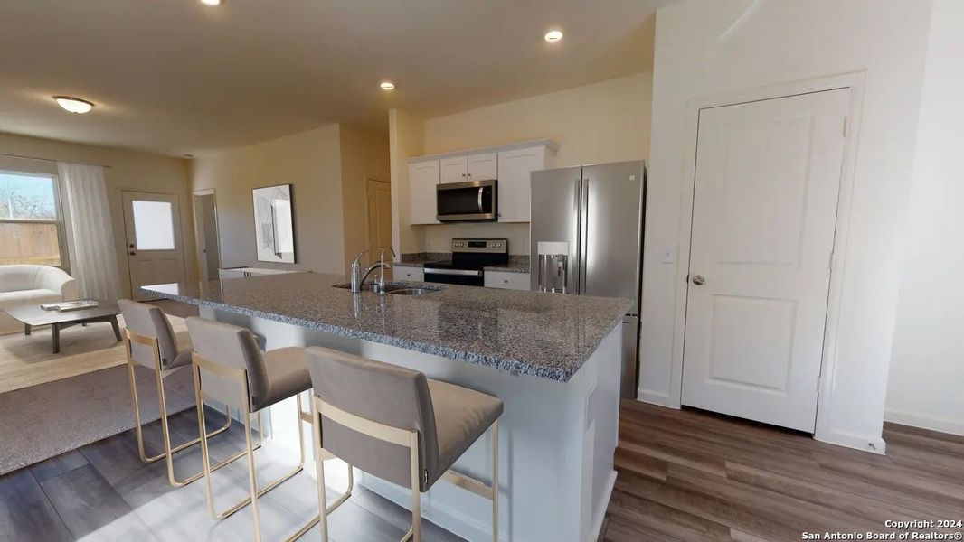 Furnished interior view inside a new home in Hennersby Hollow, San Antonio (Image 7).