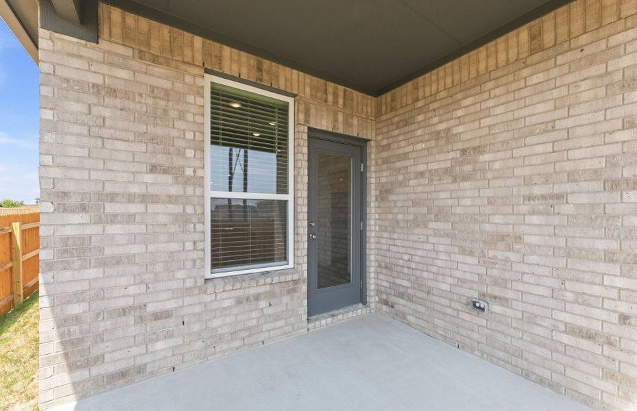 Exterior details and patio area of a home in Crosswinds, Kyle (Image 20). Exterior details and patio area of a home in Crosswinds, Kyle (Image 20).
