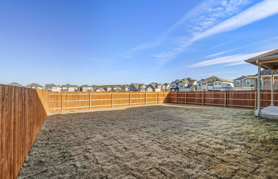 Exterior details and patio area of a home in Saddleback at Santa Rita Ranch, Liberty Hill (Image 25).