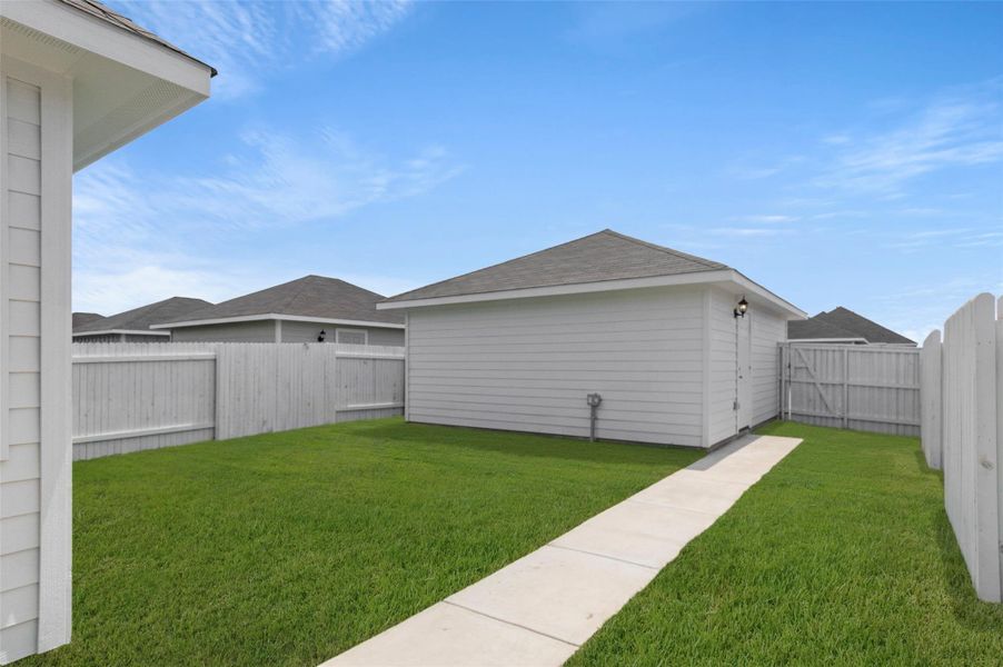 View of fenced backyard