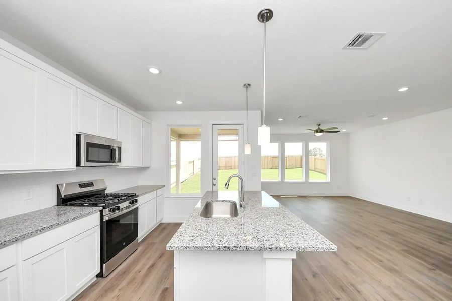 Furnished interior view inside a new home in The Canopies, Splendora (Image 4).