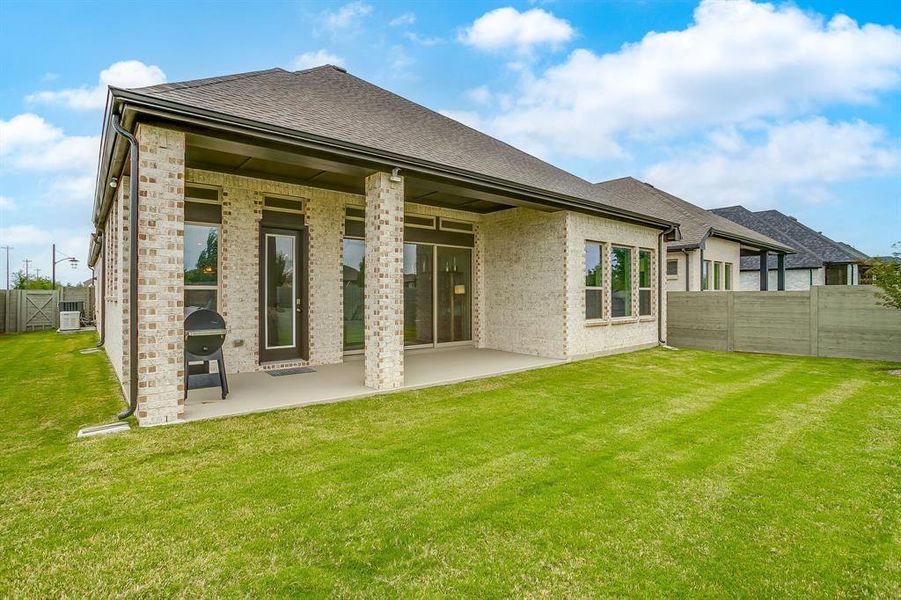 Exterior details and patio area of a home in , Argyle (Image 24).