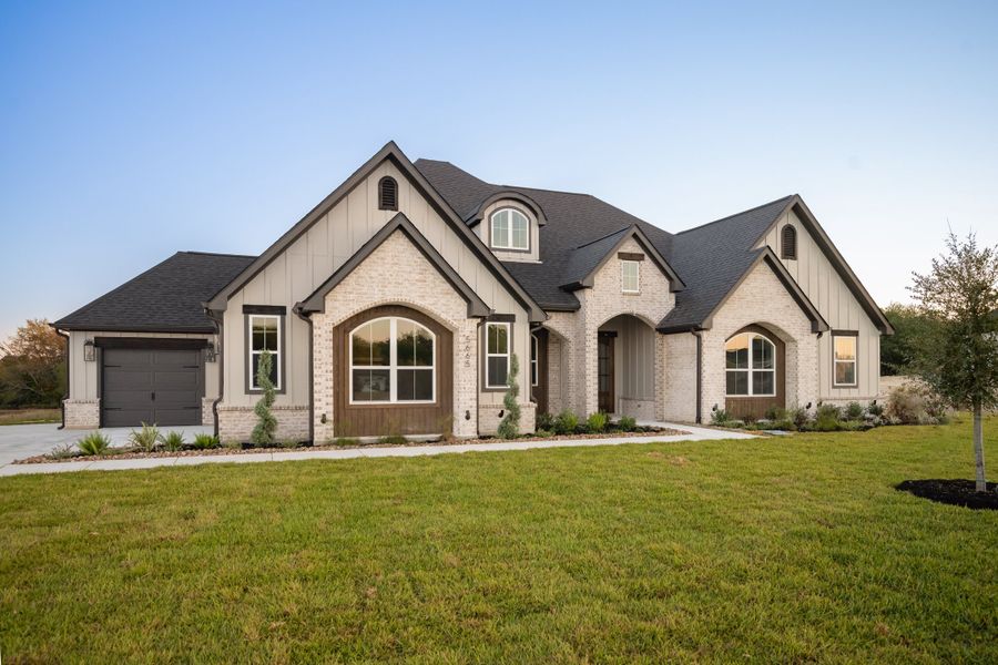 Representative exterior photo of a completed home built from the The Sophie by Reece Homes in Traditions, Bryan, TX (Image 35).