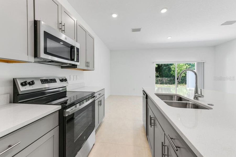 Furnished interior view inside a new home in Vinterra Townhomes, Nokomis (Image 5).