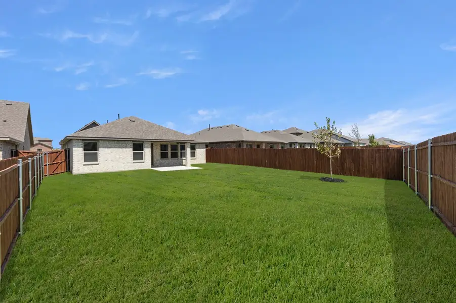 Front exterior of a new home in Northspur, Terrell, TX, highlighting curb appeal (Image 27).