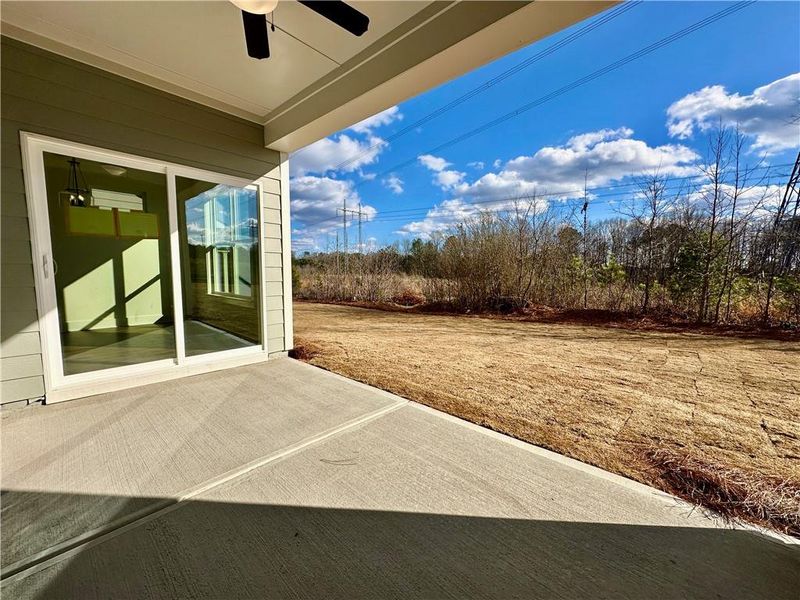 Exterior details and patio area of a home in Marble Tree, Ball Ground (Image 3).