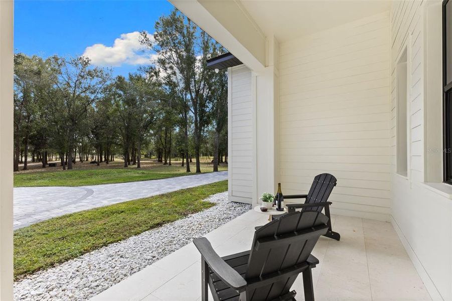 Exterior details and patio area of a home in , Myakka City (Image 28).