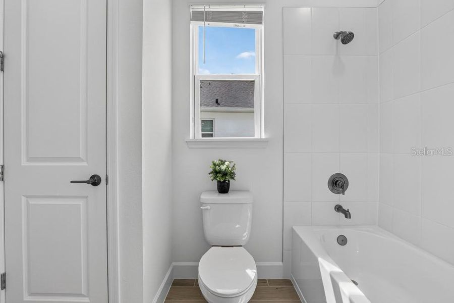 Furnished interior view inside a new home in Ardisia Park, New Smyrna Beach (Image 35).