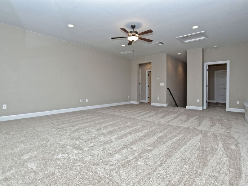 Representative unfurnished interior of a home built from the Madera II by Giddens Homes in Scofield Farms Estates, Georgetown (Image 410).