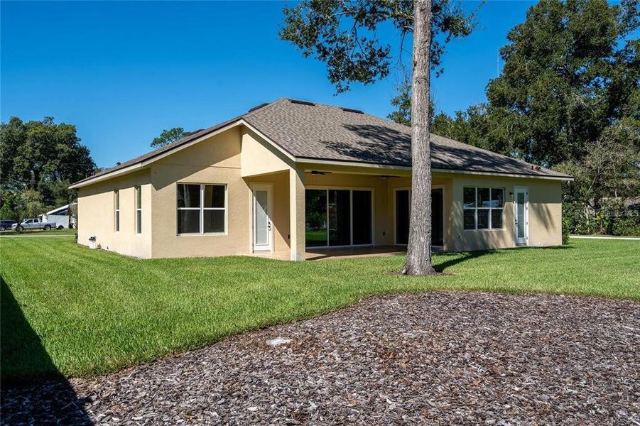 Exterior details and patio area of a home in , Orange City (Image 28).