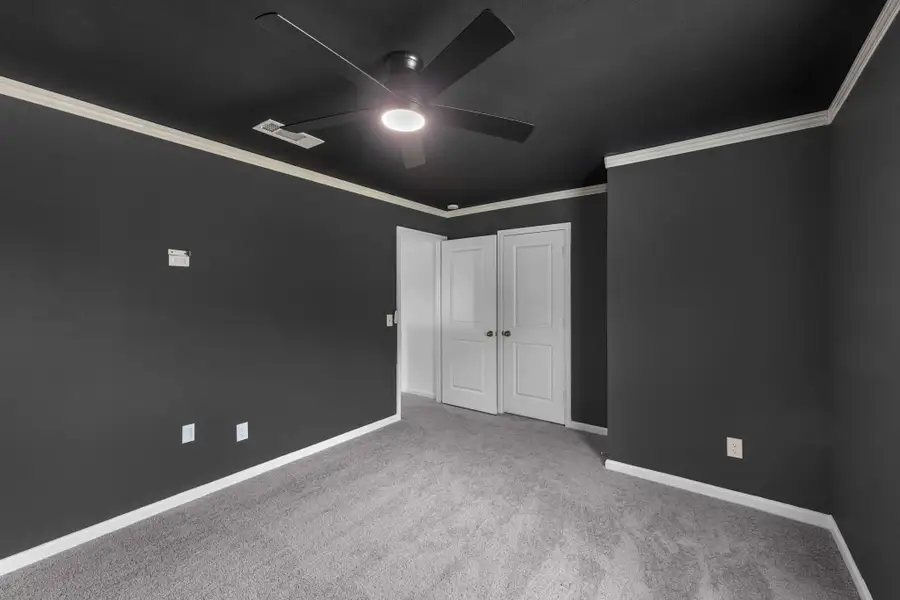 Secondary guest bedroom custom paint and crown molding