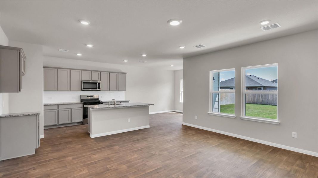 Furnished interior view inside a new home in Carillon, Manor (Image 5).