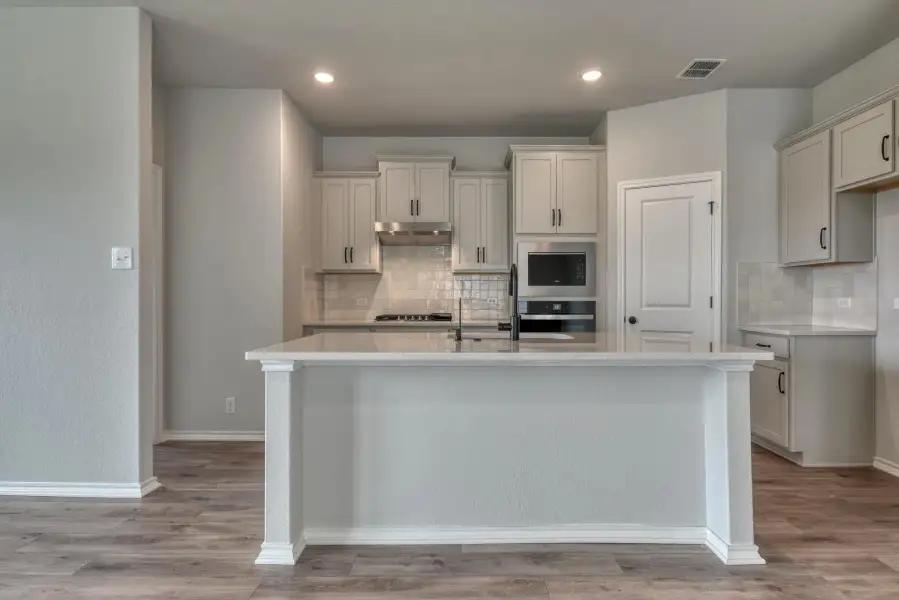 Representative furnished interior of a home built from the Hadley by Ashton Woods in Saddlebrook Ranch, Schertz (Image 5).