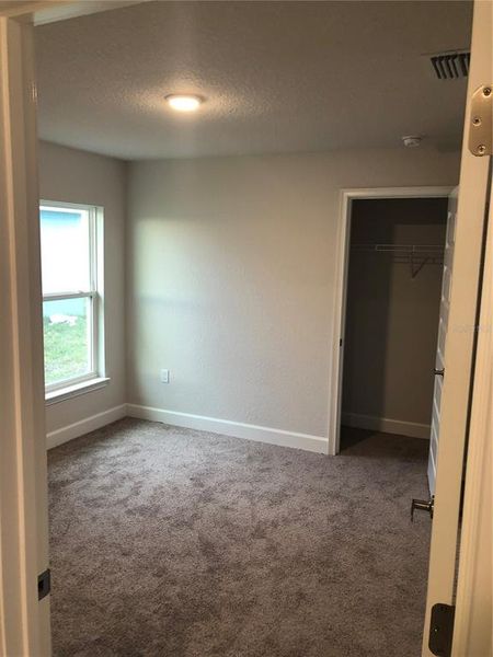 Spacious, unfurnished interior of a new home in Orange Blossom Hills, Summerfield (Image 16).