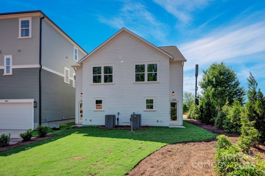 Front exterior of a new home in , Davidson, NC, highlighting curb appeal (Image 11).