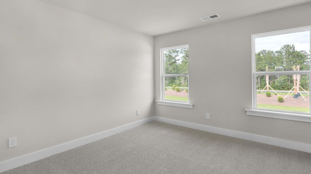 Spacious, unfurnished interior of a new home in The Haven at Indigo Preserve, Leland (Image 31).