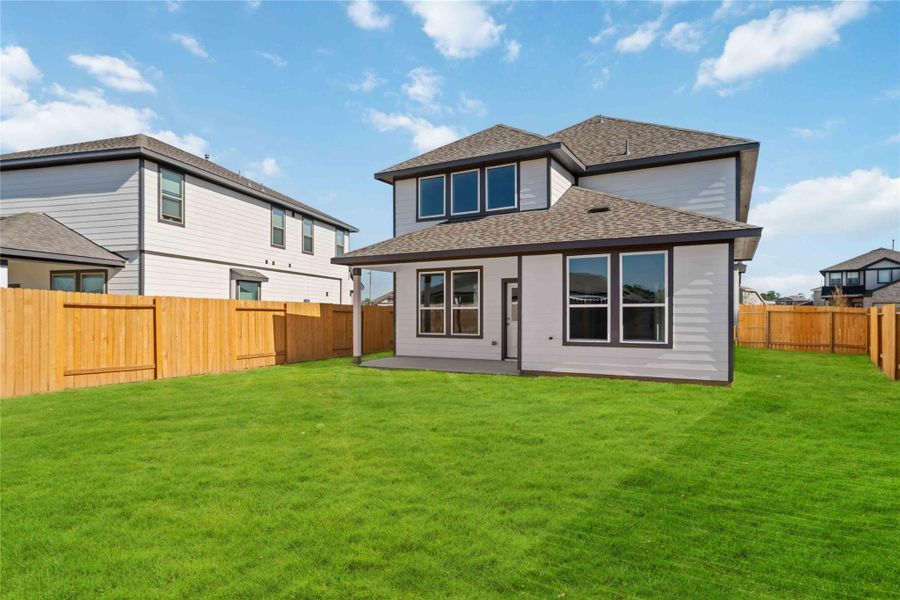 Exterior details and patio area of a home in Granger Pines, Conroe (Image 3). Exterior details and patio area of a home in Granger Pines, Conroe (Image 3).