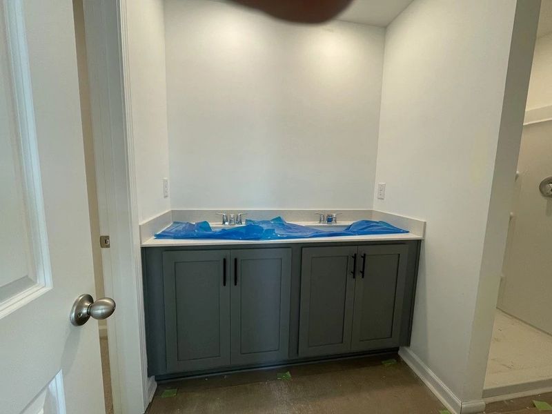 Primary Bath featuring the AW Collection® Minimalist - Sleek finishes and dramatic contrasts shine. Primary Bath featuring the AW Collection® Minimalist - Sleek finishes and dramatic contrasts shine.