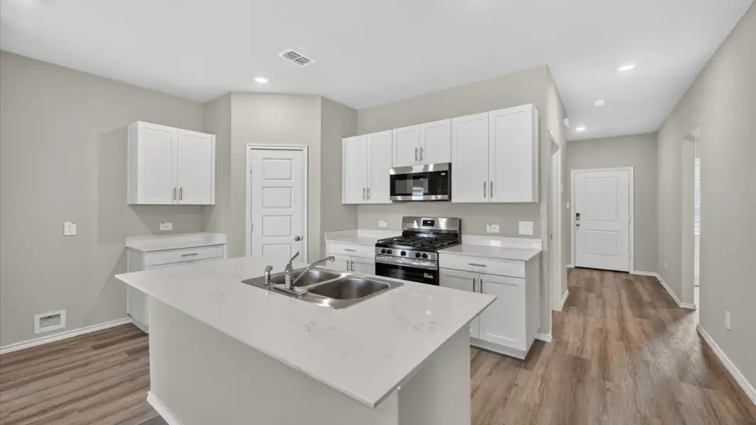 Furnished interior view inside a new home in Hadley Farms, Godley (Image 3).