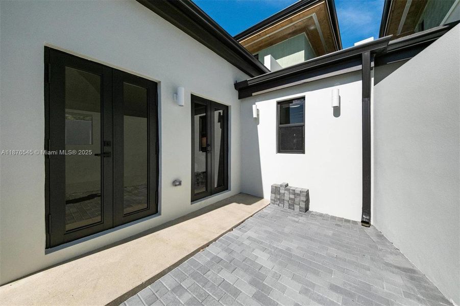 Exterior details and patio area of a home in , Miami (Image 27). Exterior details and patio area of a home in , Miami (Image 27).