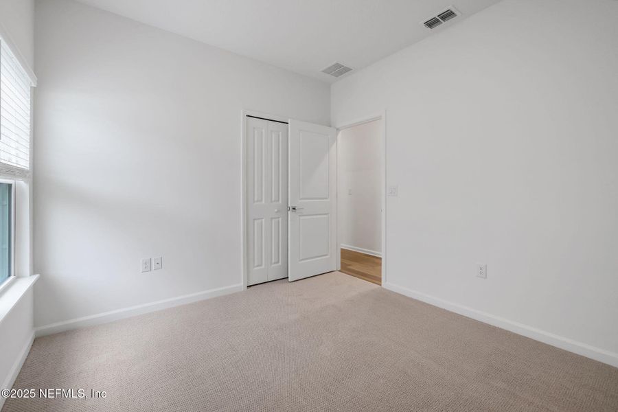 Spacious, unfurnished interior of a new home in Brook Forest, St. Augustine (Image 28).