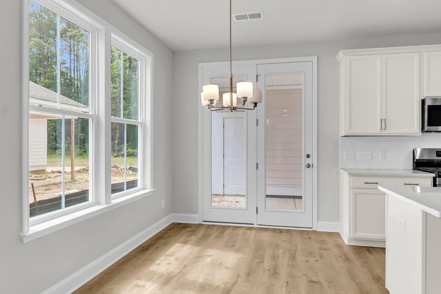 Spacious, unfurnished interior of a new home in Sweetgrass Station, Summerville (Image 23).
