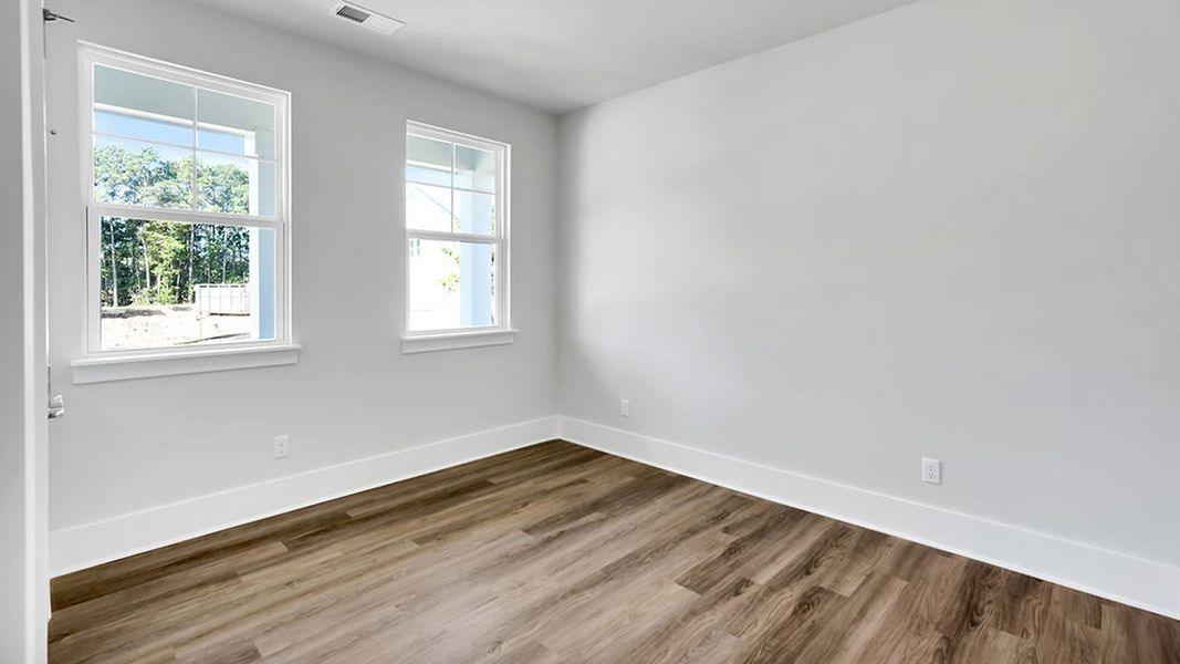 Spacious, unfurnished interior of a new home in The Haven at Indigo Preserve, Leland (Image 18).