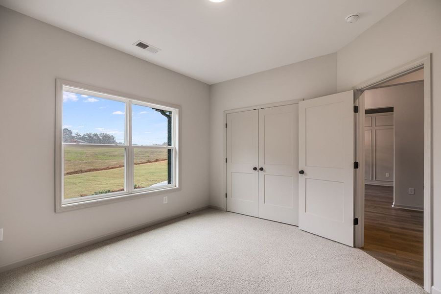 Spacious, unfurnished interior of a new home in Parmer Farms, Roopville (Image 34).