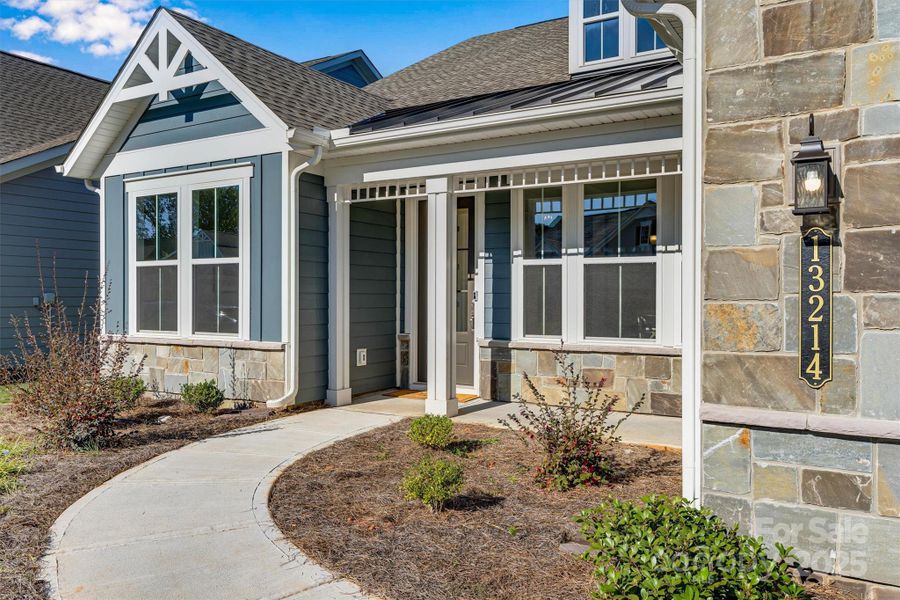 Exterior details and patio area of a home in , Charlotte (Image 2). Exterior details and patio area of a home in , Charlotte (Image 2).