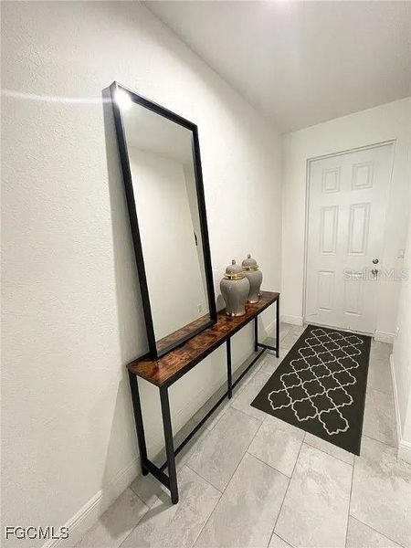 Furnished interior view inside a new home in , Port Charlotte (Image 6). Furnished interior view inside a new home in , Port Charlotte (Image 6).