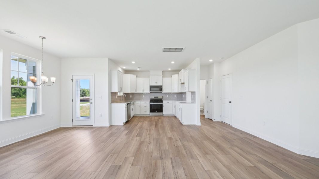 Representative furnished interior of a home built from the Bordeaux by DRB Homes in Station Pointe, Angier (Image 11). Representative furnished interior of a home built from the Bordeaux by DRB Homes in Station Pointe, Angier (Image 11).