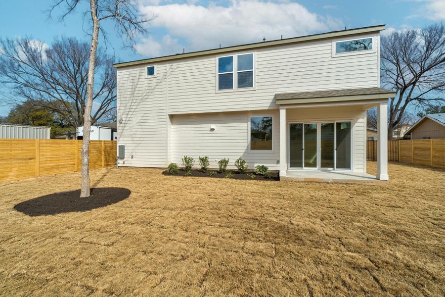 Beautiful landscaping, automated sprinkler system and fully fenced patio.