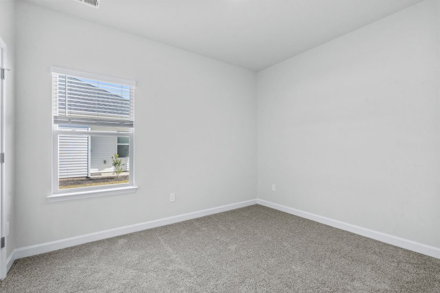 Spacious, unfurnished interior of a new home in Cypress Ridge - The Boardwalk Series, Longs (Image 24).