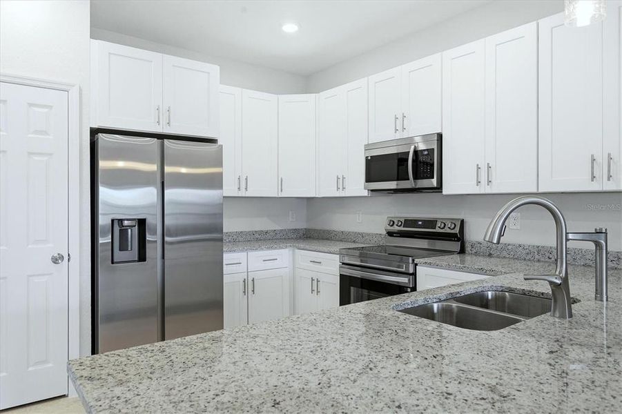 Furnished interior view inside a new home in , North Port (Image 15).