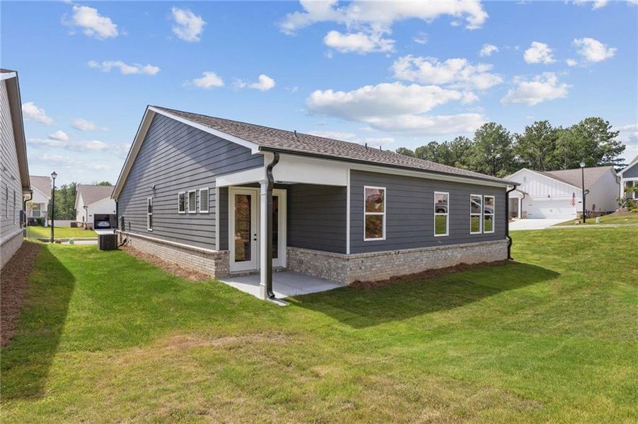 Exterior details and patio area of a home in Kelly Preserve, Loganville (Image 3).