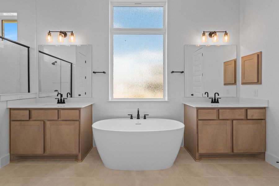 Primary Bath retreat with dual vanities & soaking tub Primary Bath retreat with dual vanities & soaking tub