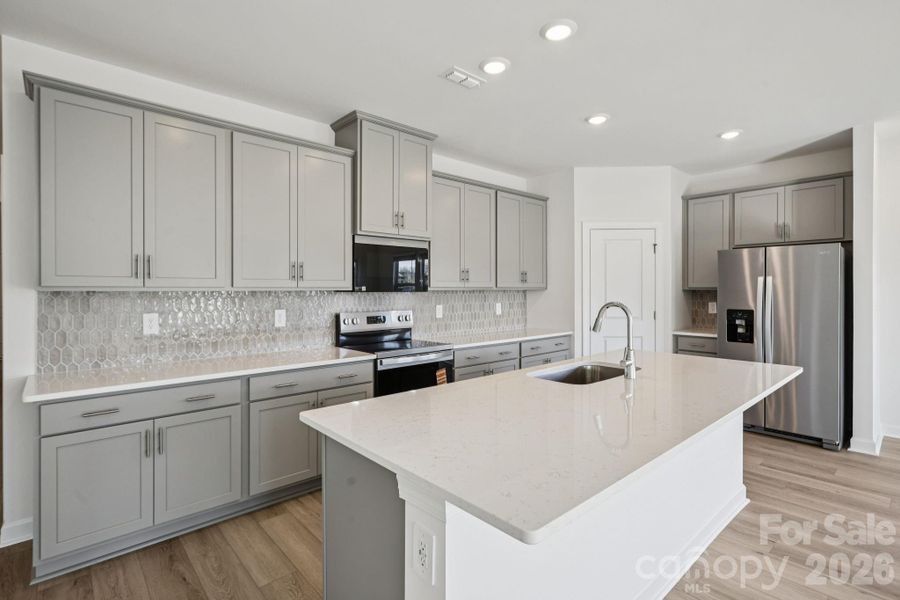Photo is not of the actual home, but is an inspirational photo of builder’s model home and may depict options, furnishings, and/or decorator features that are not included
