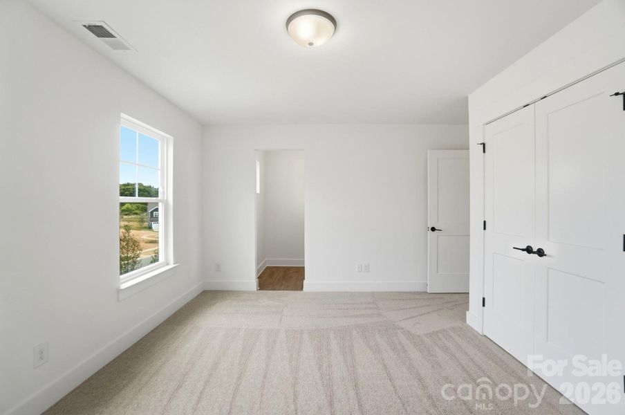 Spacious, unfurnished interior of a new home in Robinson Oaks, Gastonia (Image 37).