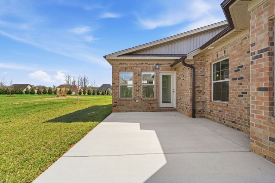 Exterior details and patio area of a home in Weybridge, Burlington (Image 32).
