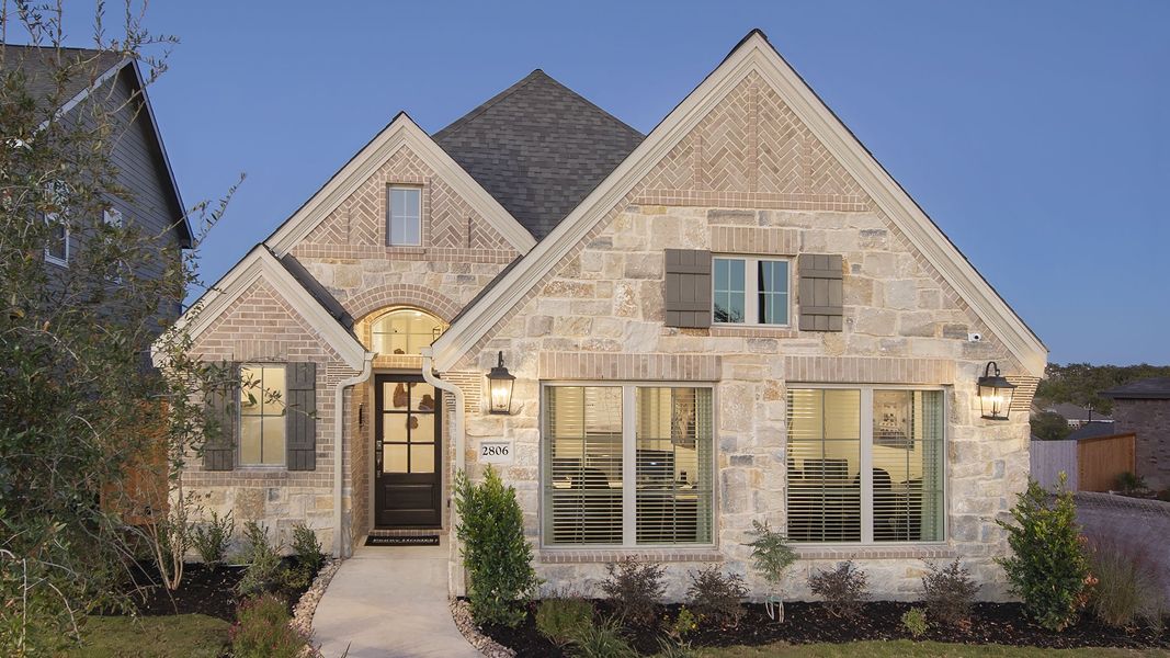 Front exterior of a new home in Brookewater, Rosenberg, TX, highlighting curb appeal (Image 20).