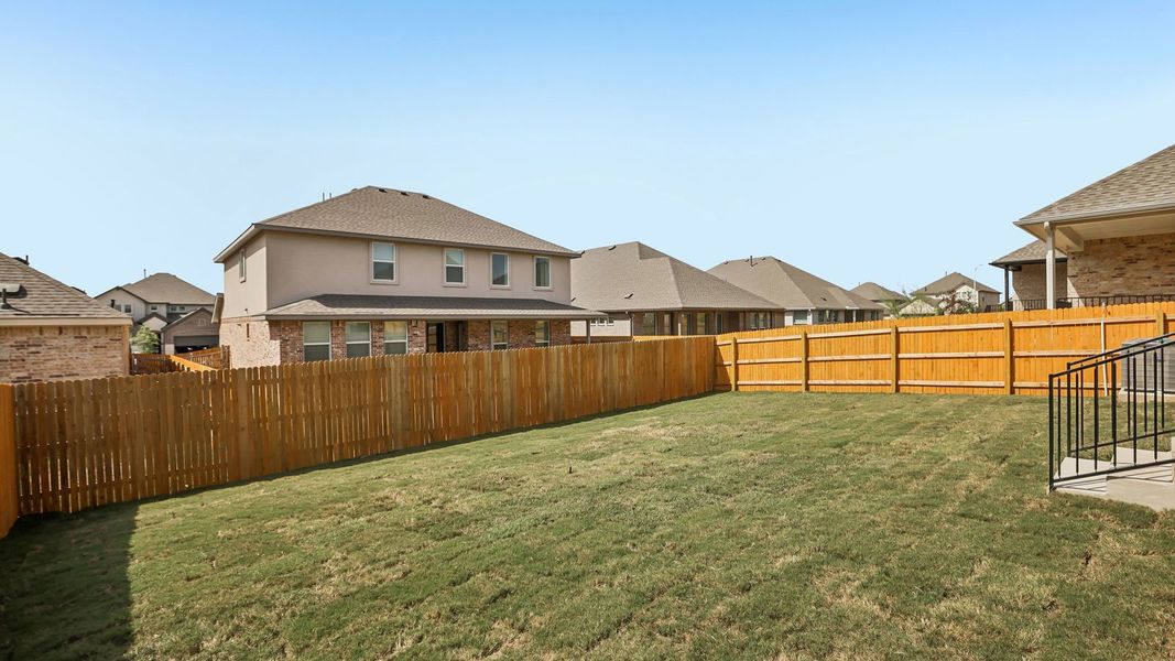 Exterior details and patio area of a home in Rosenbusch Ranch, Leander (Image 27).