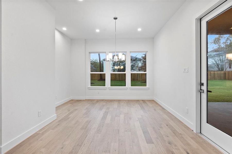 Breakfast with views and access to the covered rear patio and back yard.