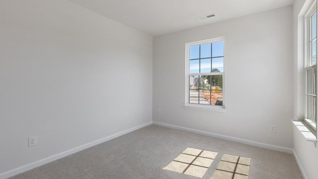 Spacious, unfurnished interior of a new home in The Townes at Matthews Landing, Fuquay Varina (Image 21). Spacious, unfurnished interior of a new home in The Townes at Matthews Landing, Fuquay Varina (Image 21).