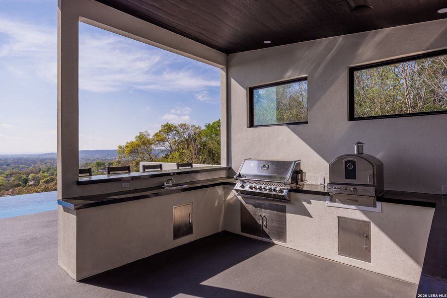 Exterior details and patio area of a home in , Kerrville (Image 33).