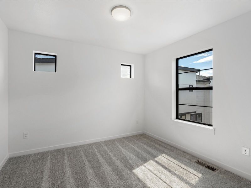 Spacious, unfurnished interior of a new home in The Commons at Victory Ridge, Colorado Springs (Image 7).
