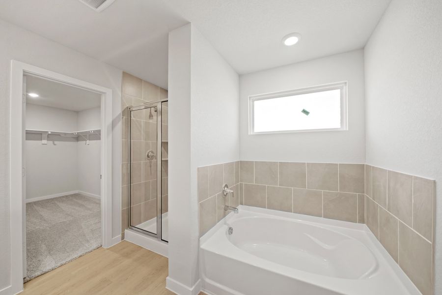 A bathroom with a glass shower.