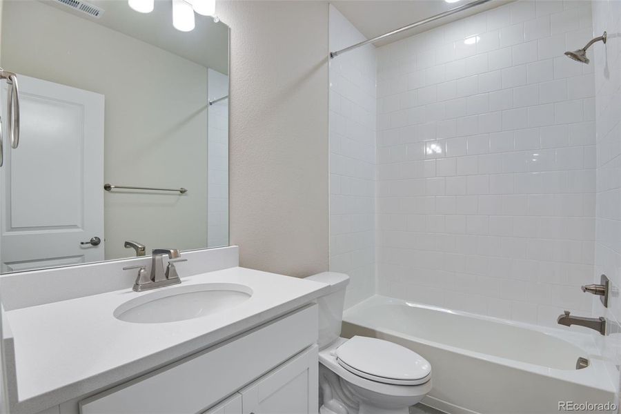 Furnished interior view inside a new home in Ensemble at The Aurora Highlands, Aurora (Image 7).