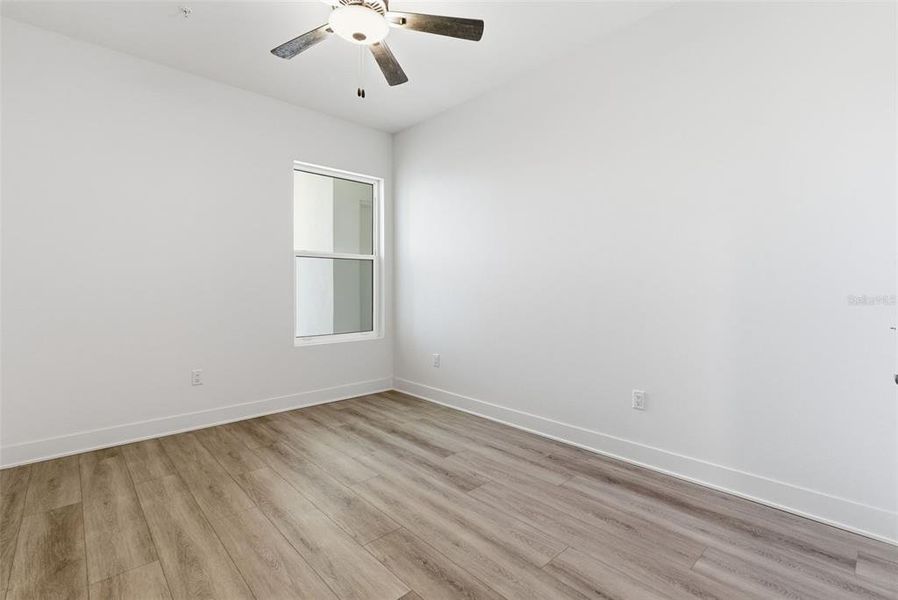 Spacious, unfurnished interior of a new home in Residences at Town Center, Madeira Beach (Image 21).