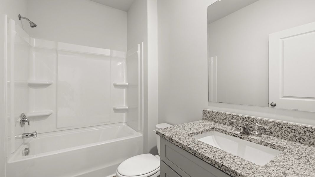 Representative furnished interior of a home built from the Robie by D.R. Horton in Highland Hills, Graniteville (Image 7).