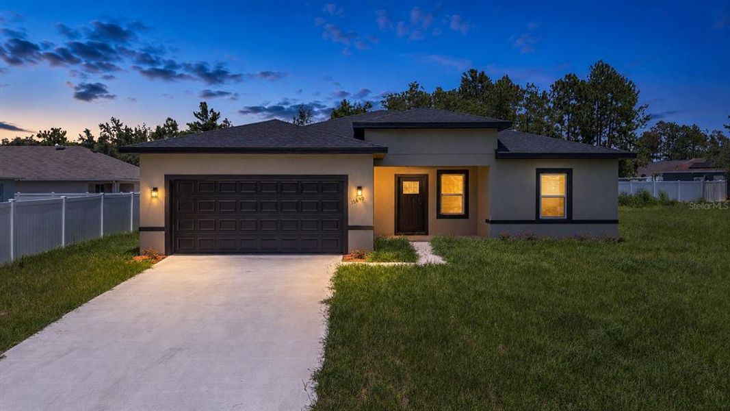 Front exterior of a new home in , Ocala, FL, highlighting curb appeal (Image 25). Front exterior of a new home in , Ocala, FL, highlighting curb appeal (Image 25).